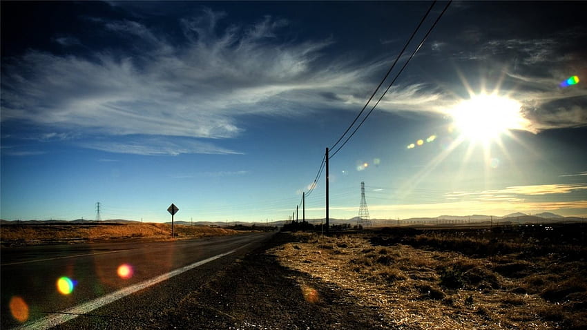 midday sun over highway through the prairie, prairie, beams, electric line, sky, sun, highway HD wallpaper