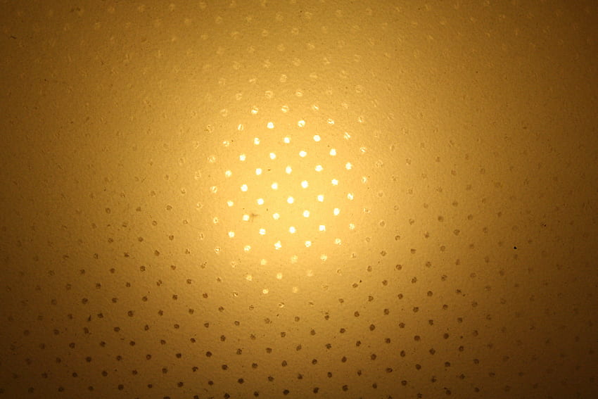 Goldfarben. Licht durch Glasschirm mit Lochstruktur. Graph. Goldener Hintergrund, goldener Hintergrund, erstaunlich HD-Hintergrundbild