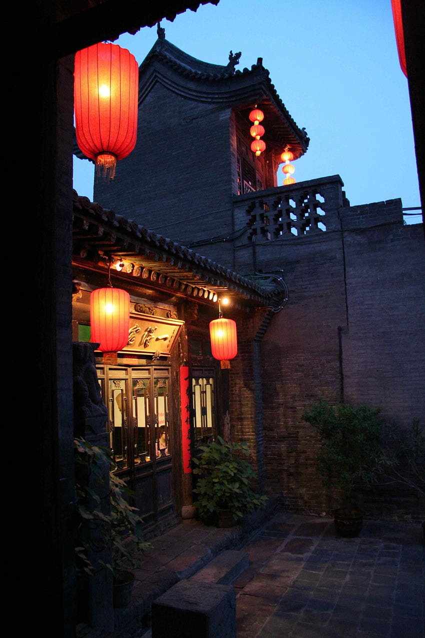 Sebuah halaman di sebelah teras rumah di kota kuno Pingyao wallpaper ponsel HD