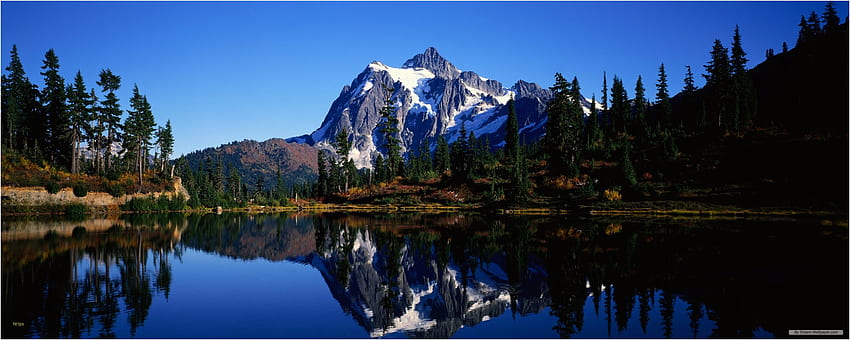 Cùng tận hưởng màn hình kép đầy ấn tượng với vườn quốc gia North Cascades, nơi sắc màu thiên nhiên được thăng hoa với cảnh sắc đẹp như tranh vẽ. Hãy để bản thân thư giãn và cảm nhận vẻ đẹp hoang sơ, mênh mông của núi rừng Bắc Mỹ.
