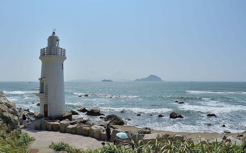 Lighthouse by Ocean, umbrella, lighthouse, rocks, ocean HD wallpaper