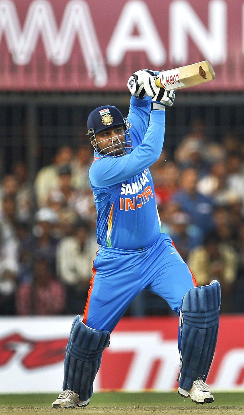 Virender Sehwag stellte einen neuen ODI-Rekord auf: 219 in 149 Bällen. . Indien gegen Westindien, Virendra Sehwag HD-Handy-Hintergrundbild