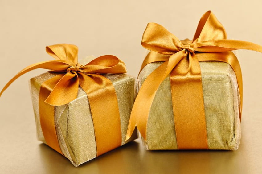 Wrapped In Gold, golden, ribbons, wrapped, holiday, satin, presents, yellow, christmas, elegance HD wallpaper