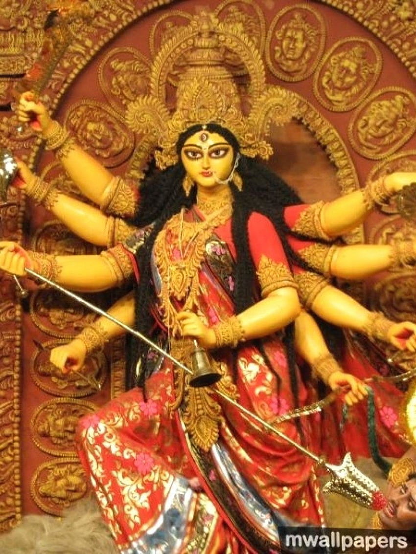 Image may contain 1 person indoor  Durga maa Durga Durga goddess
