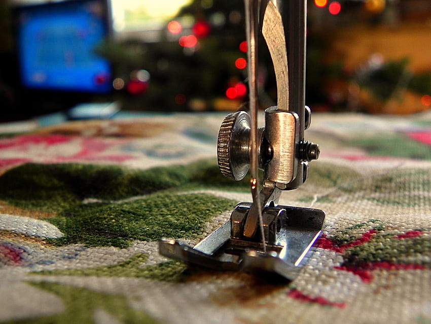 pieza de máquina de coser de acero inoxidable fondo de pantalla