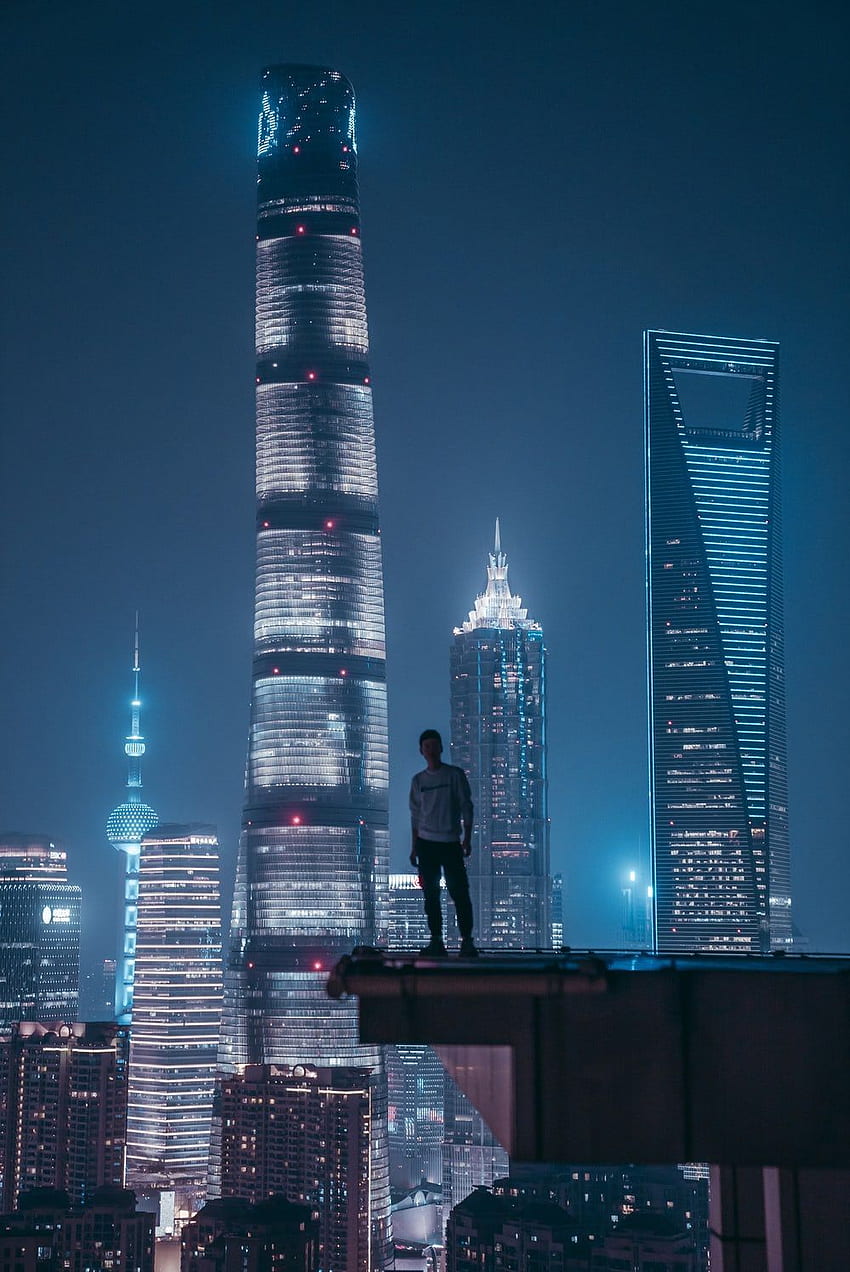 man standing on top of skyscraper. Skyscraper, City aesthetic, Cute background, Top Building HD phone wallpaper
