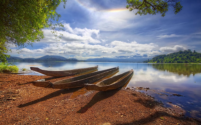 Reflexión del lago del barco del paisaje de Vietnam Lac. fondo de pantalla