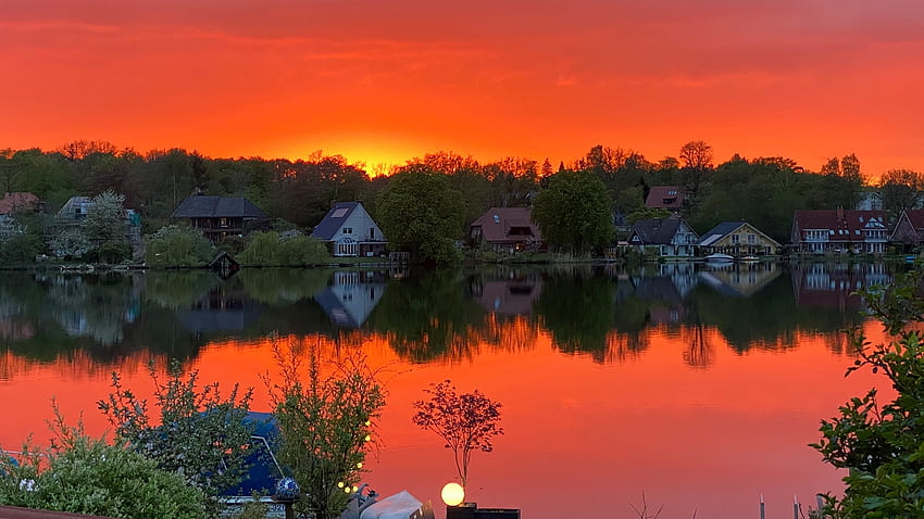 Sunset at a lake in Northern Germany, trees, colors, sky, sun, water, reflections HD wallpaper