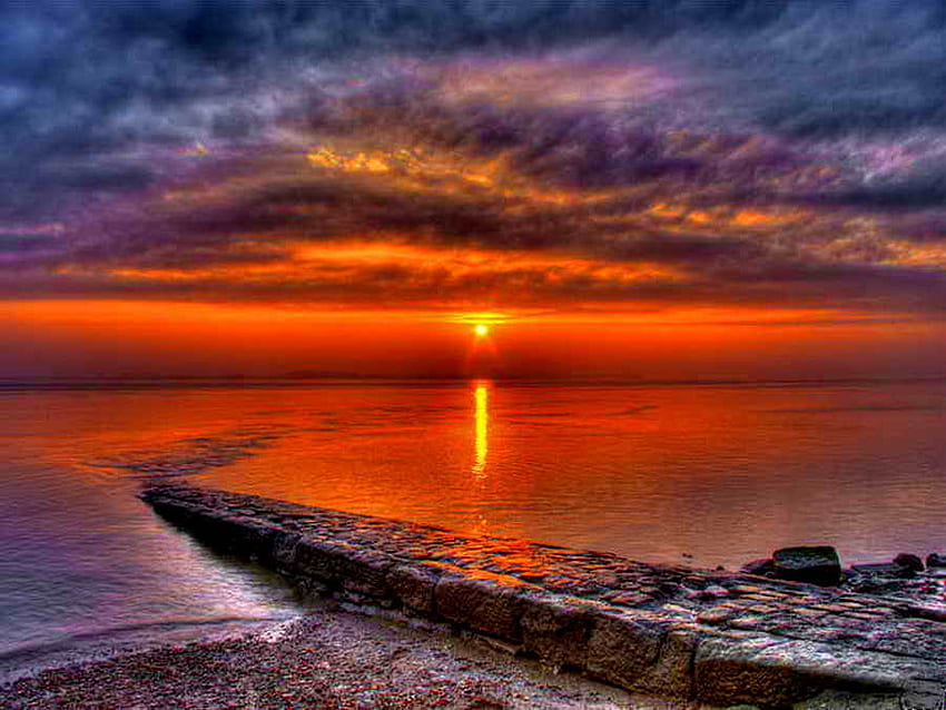 Beautiful sunset, sea, sunlight, sundown, stones, beach, shore, reflection, red, clouds, nature, sky, pureple, water, sun, sunset, ocean HD wallpaper