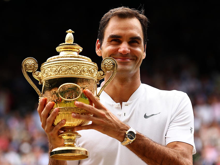 Il record di Roger Federer sorprende persino se stesso mentre l'anno da favola continua con l'ottavo titolo di Wimbledon. L'indipendente Sfondo HD