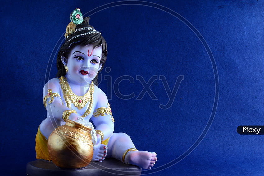 Of Little Krishna Idol On Dark Blue Background KL973955 Picxy, Krishna Dark HD wallpaper