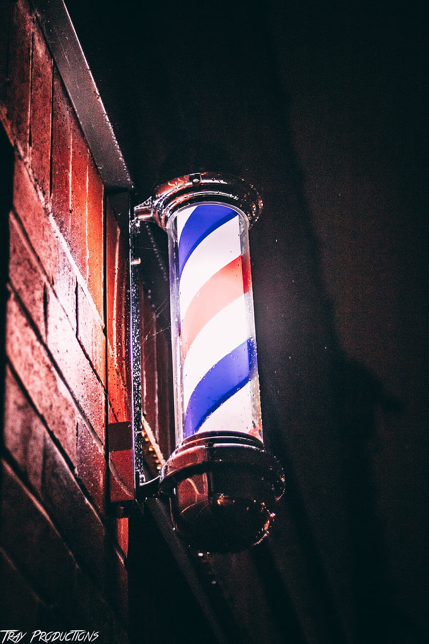 stock de poste de barbero, azul, pared de ladrillo fondo de pantalla del teléfono