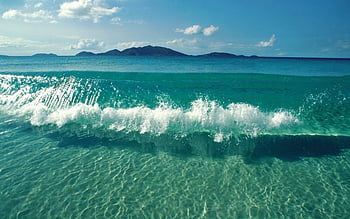 Hình nền biển đẹp: Thưởng thức bức ảnh hình nền biển đẹp này và cảm nhận sự thanh bình và yên tĩnh trong từng pixel. Bức ảnh sẽ cho bạn cảm giác như đang đứng trên bãi biển và nghe sóng vỗ bờ. 