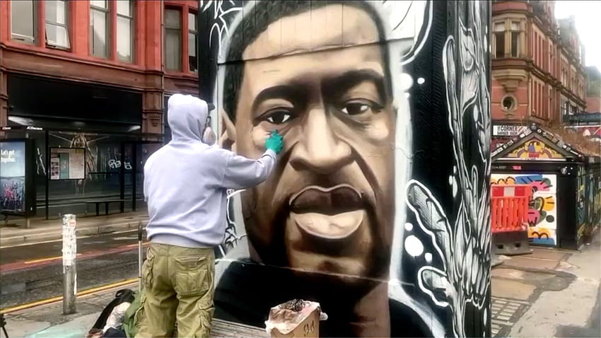 Straßenkünstler malt Wand von George Floyd in Manchester HD-Hintergrundbild