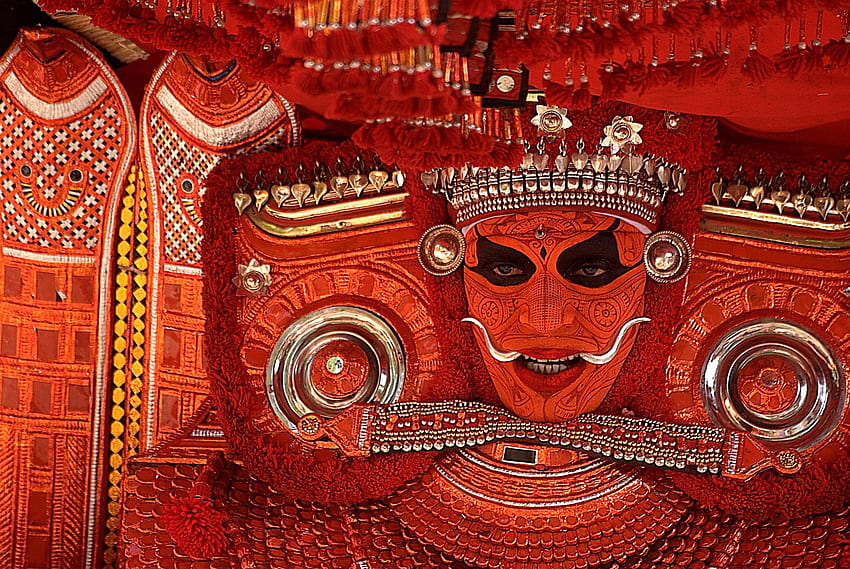 A Performer from the Theyyam religious ritual, Kerala, India HD wallpaper
