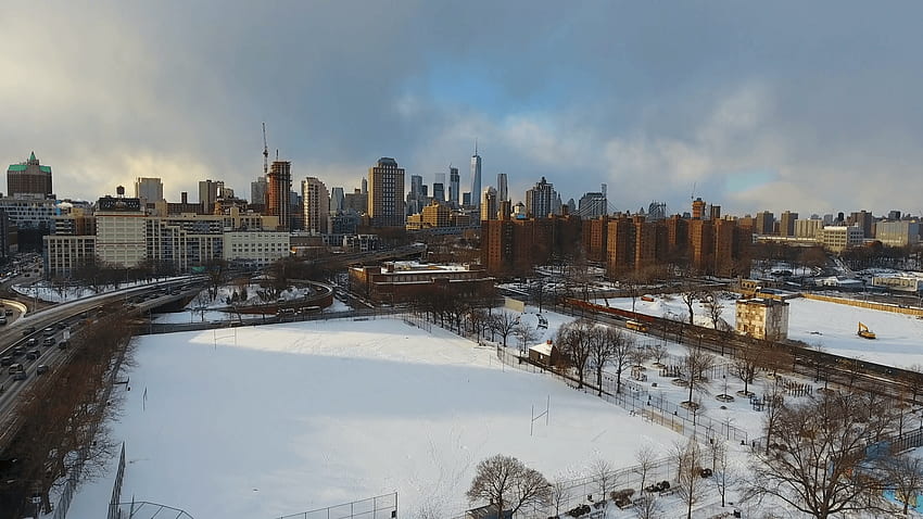 Aerial Hover Of Brooklyn and New York Skyline During Winter Stock HD wallpaper