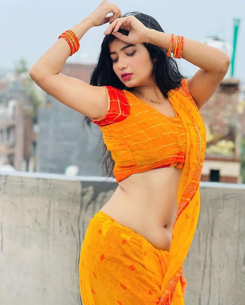 Neha Singh, naranja, cara fondo de pantalla del teléfono