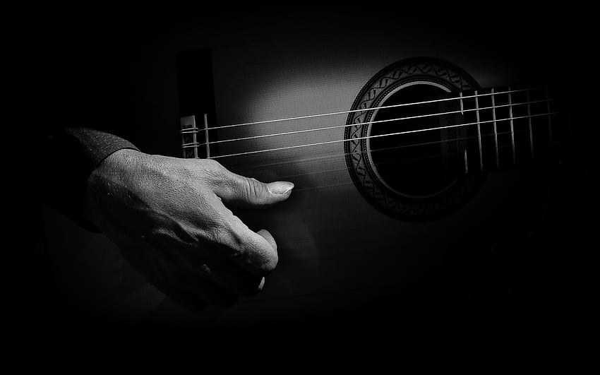 Ręka gracza ze strunami ciemnej gitary - Tapeta HD