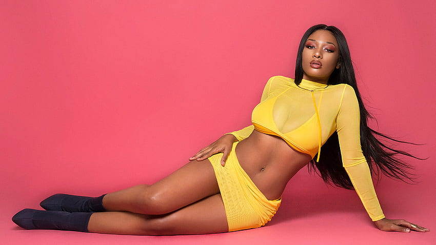 Megan Thee Stallion's unstoppable talent. Throw Up Magazine HD wallpaper