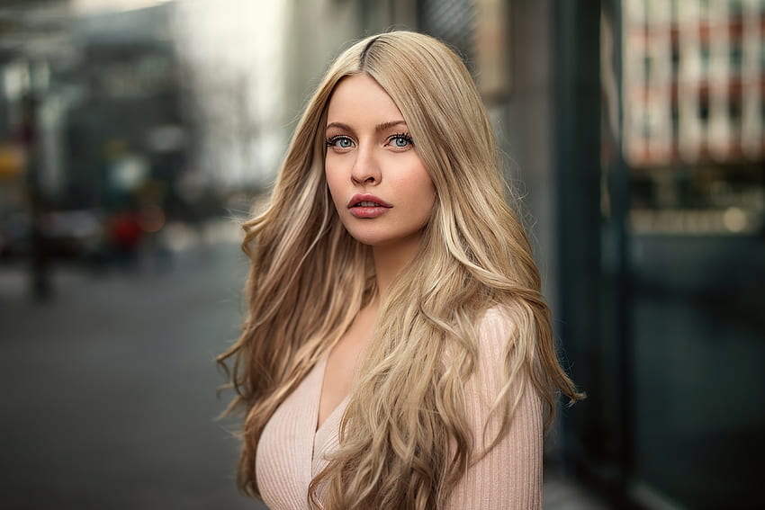 Mujer modelo, ojos azules, pelo largo. fondo de pantalla