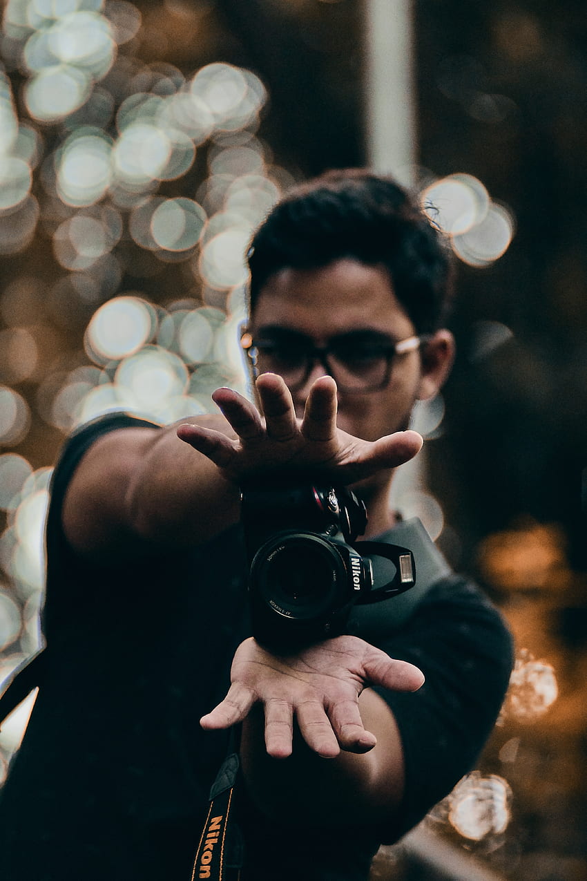 Man With Camera Between His Hands · Stock, Camera Hands graphy HD phone wallpaper