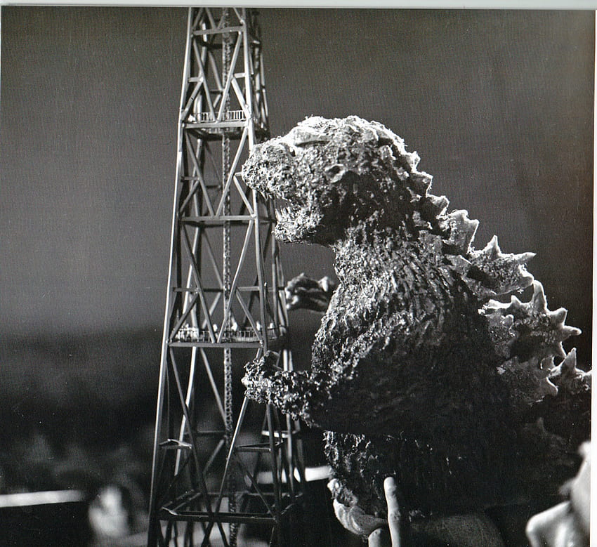 Godzilla puppet attacks scale model tower in GODZILLA (1954). Movie monsters, Kaiju monsters, Monster HD wallpaper