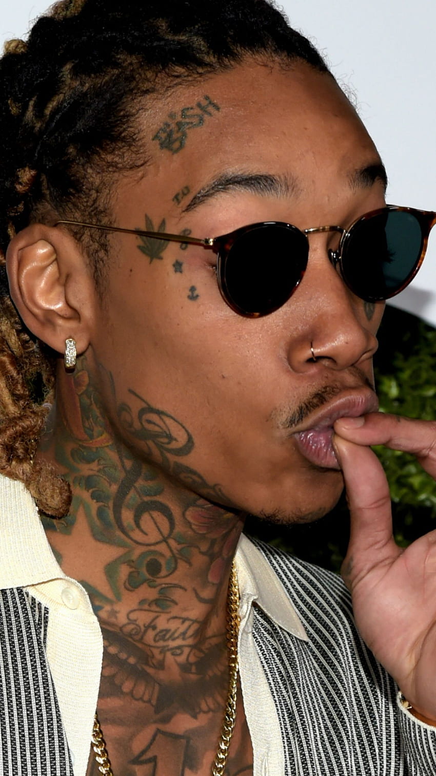 Amber Rose Gets Wiz Khalifas Stoned Face Tattooed on Her Arm