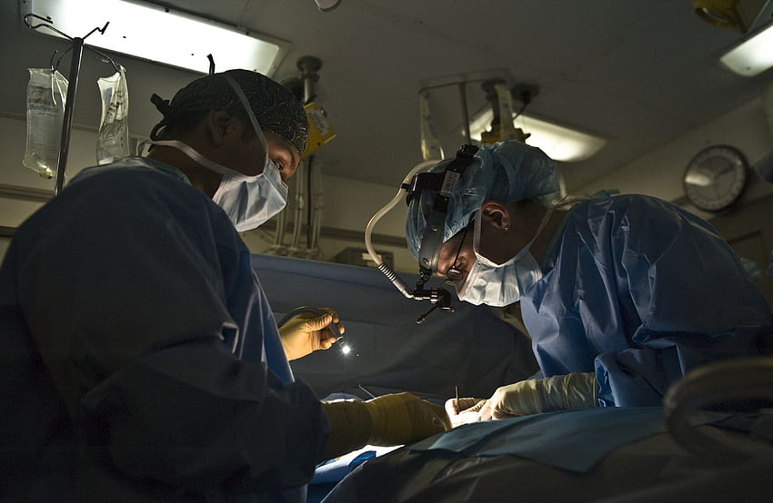 doctors performing surgery inside dark room HD wallpaper