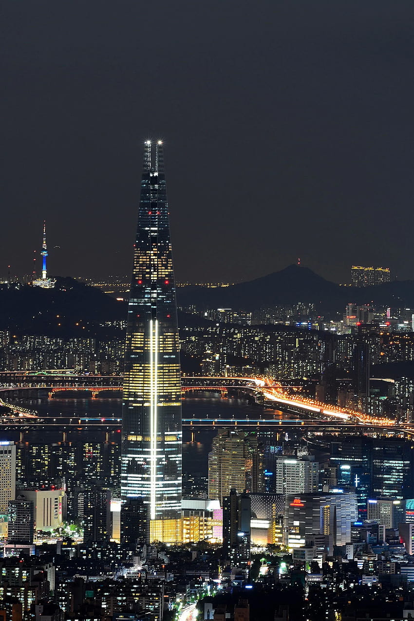 Lotte World Tower y las luces nocturnas de Seúl, Corea del Sur [17132570]. Gráfico de Corea del Sur, Noche de Seúl, Mundo de Lotte, Noche de la ciudad de Seúl fondo de pantalla del teléfono