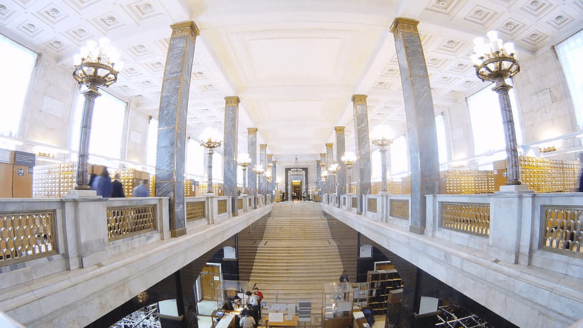 Readers go on lobby at cardfile of huge library, time lapse Stock HD wallpaper