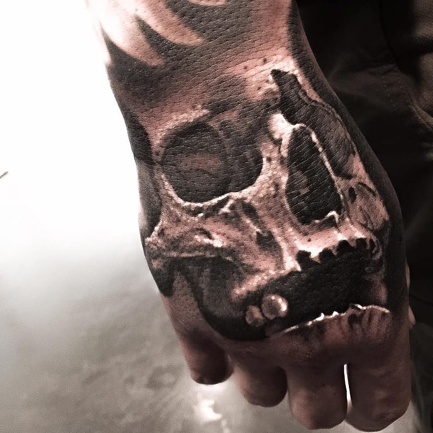 Skull hand tattoo realism  Skull hand tattoo Hand tattoos for guys Back  of hand tattoos