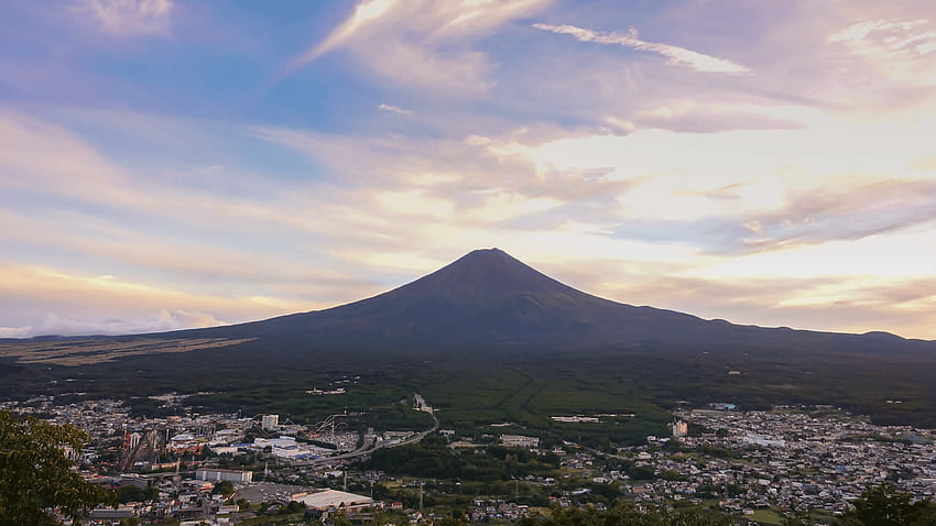 Timelapse of Mt. Fuji on sunset with city Kawaguchiko Japan Stock HD wallpaper