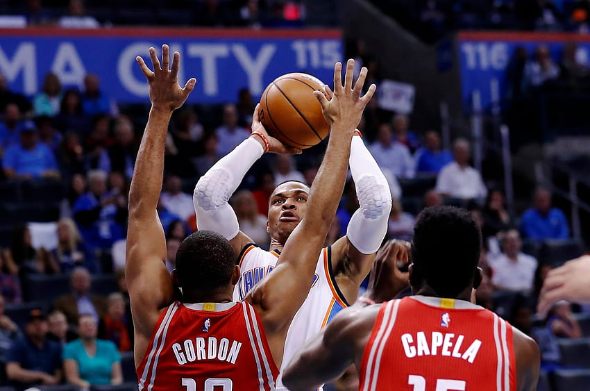 Westbrook shot over Eric Gordon and Clint Capela of the Rockets this month. Credit Alonzo Adams/Associated Press HD wallpaper