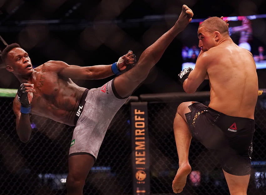 UFC: Israel Adesanya würde Jon Jones brüskieren und Stipe Miocic einen geben HD-Hintergrundbild