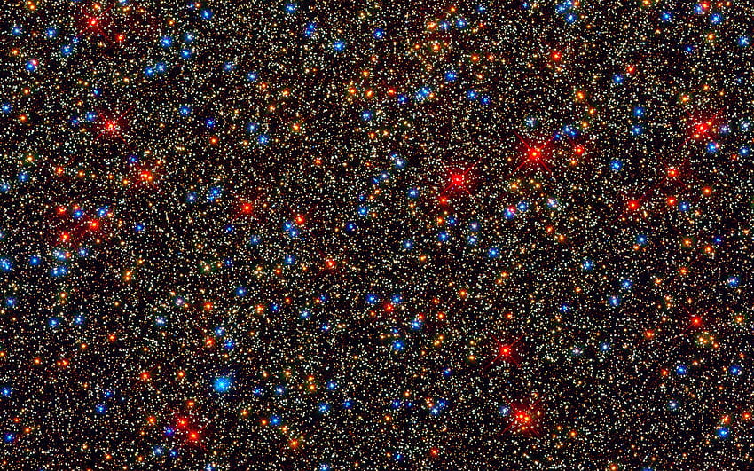 Изобилие от цветни звезди в кълбовидния звезден куп Омега, от телескопа Хъбъл HD тапет